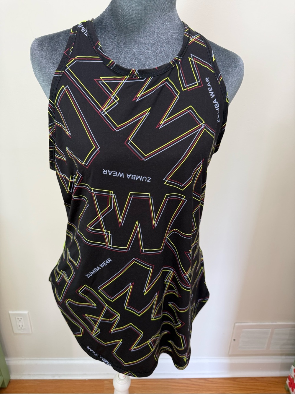 Zumba Fitness Neon Yellow Mesh Top with Black Trim and Multicolor Stripe Detail - Picture 2 of 13